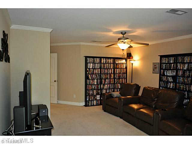 8401 Parkchester Place Oak Ridge, NC 27310 - Photo 11 of 16 4th Bedroom. The present owners use the 4th bedroom as a home theater. One that has a big walk-in closet and a full en suite bath.