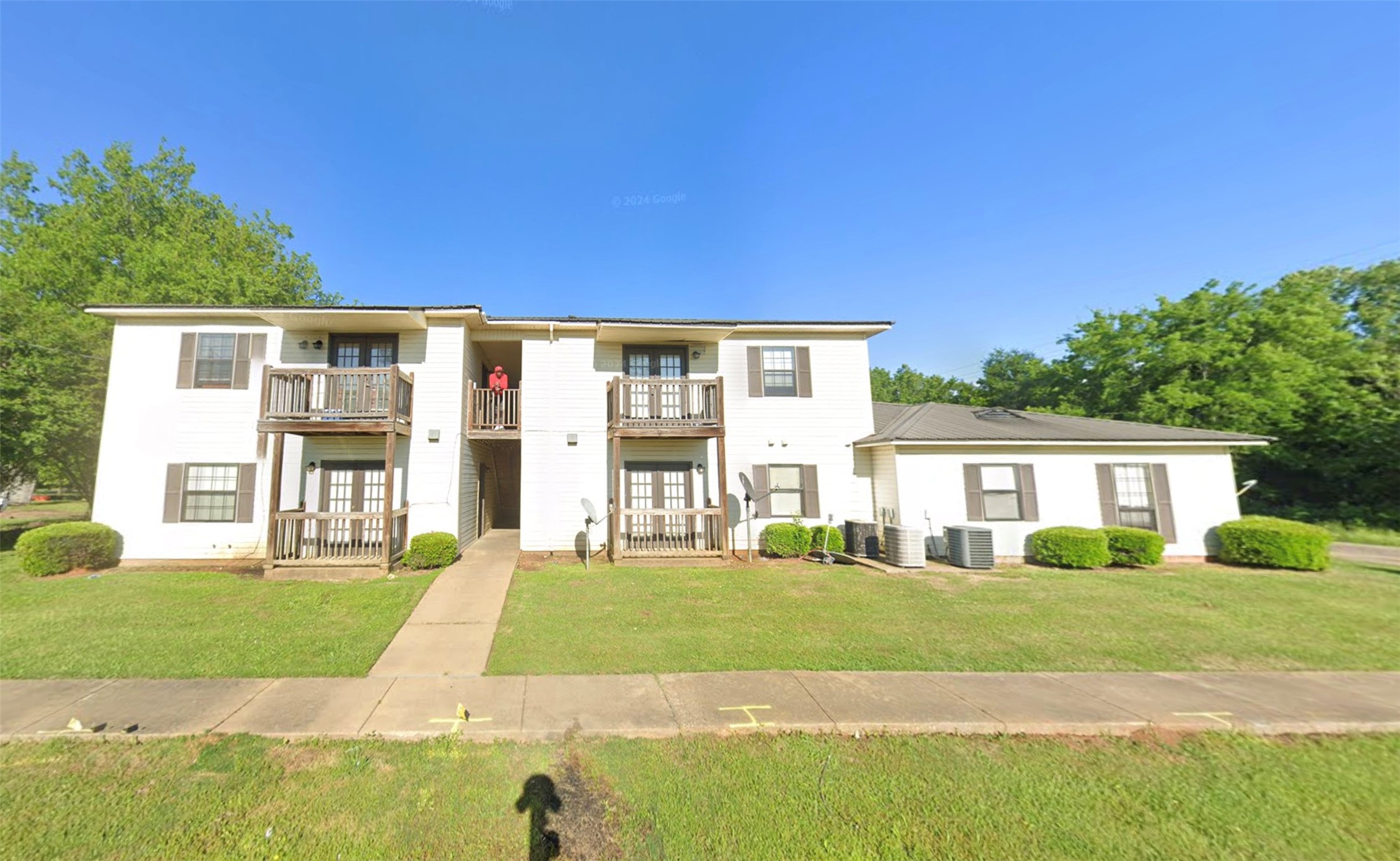 130 South Street Other, AL 36786 - Photo 7 of 7 a view of white house with a big yard and large trees