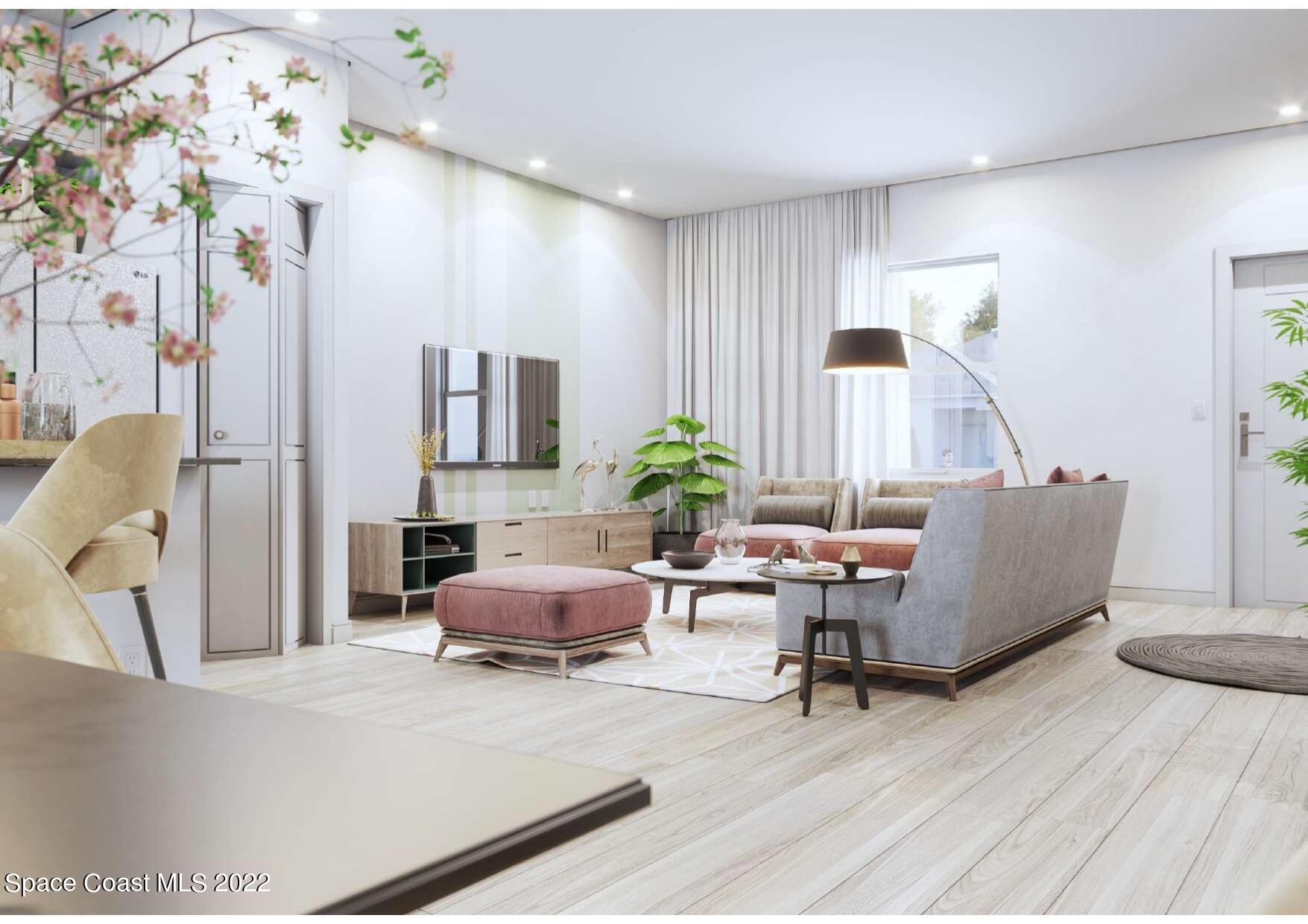 1113 Dorchester Road Palm Bay, FL 32907 - Photo 4 of 7 a living room with furniture and wooden floor