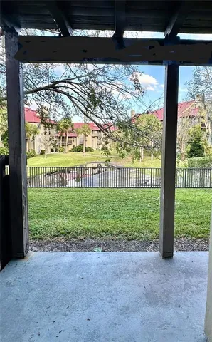 a view of a yard with a garage