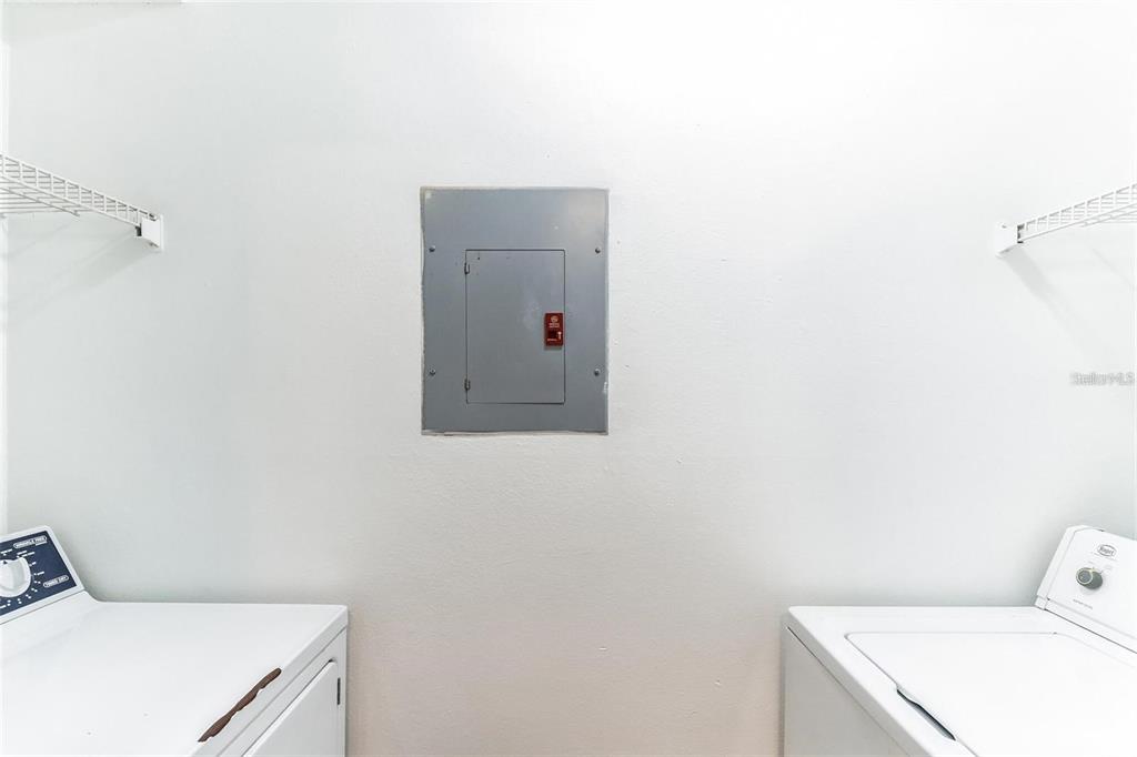 241 Afton Square, Unit 102 Altamonte Springs, FL 32714 - Photo 9 of 12 a bathroom with a toilet and sink