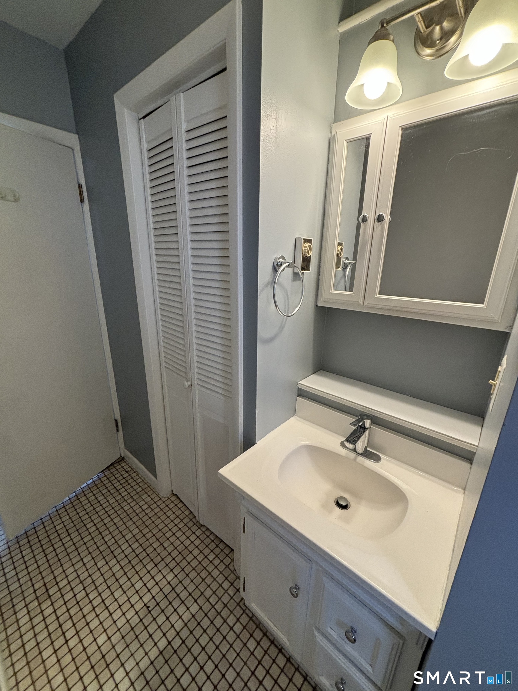 11 Roberts Street, Unit 2 Bristol, CT 06010 - Photo 11 of 11 a bathroom with a sink toilet and shower