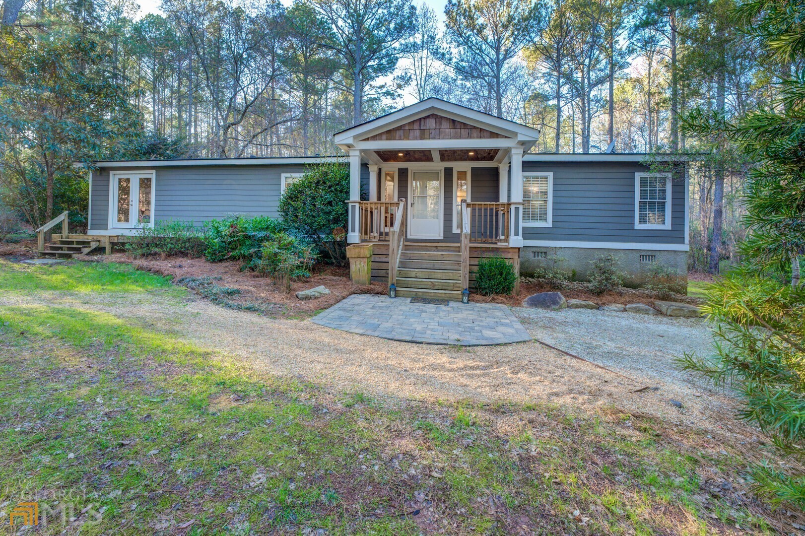 2691 Newborn Road Mansfield, GA 30055 - Photo 1 of 1 a front view of a house with a yard and porch