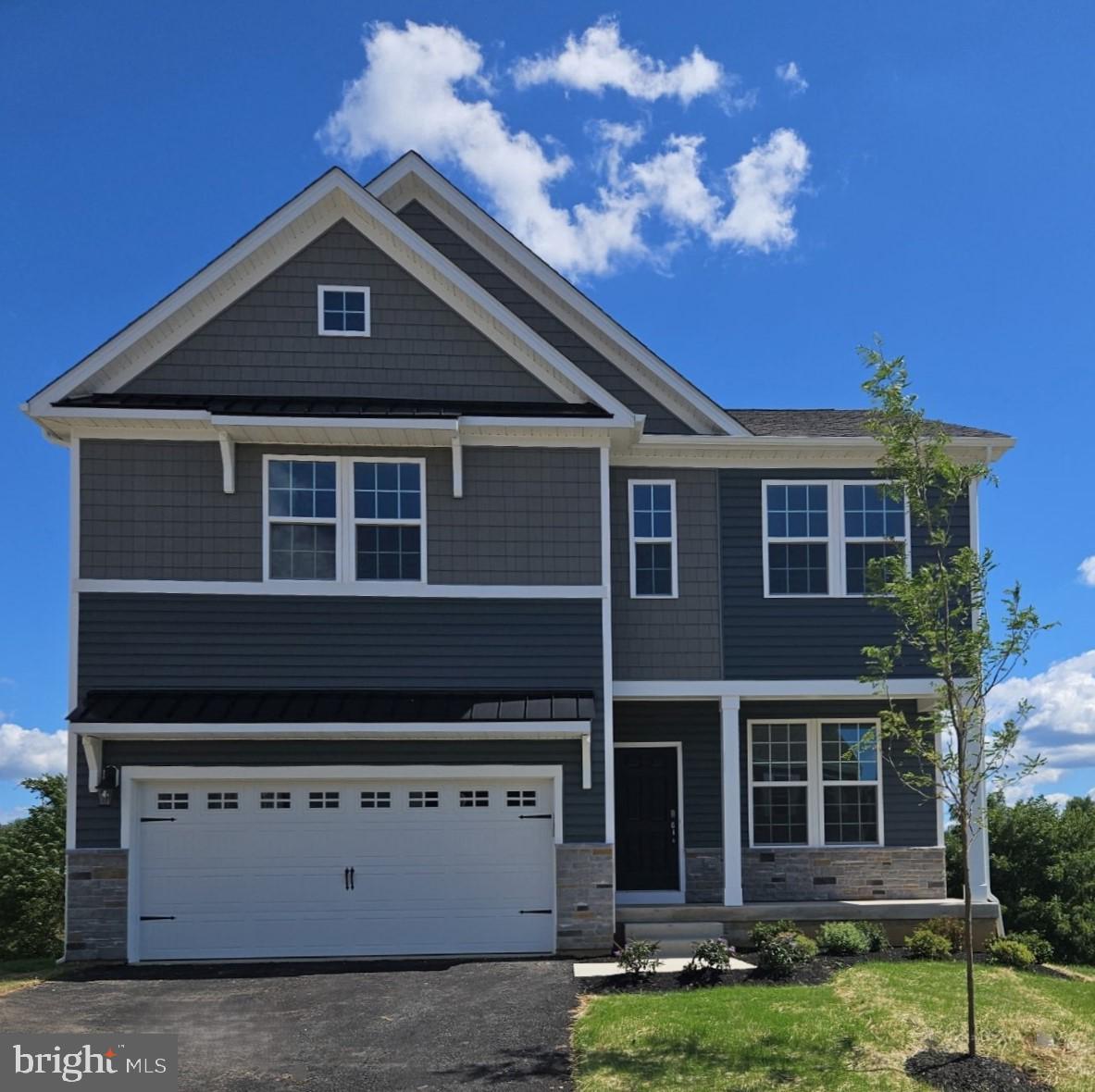 117 Winding Road Easton, PA 18040 - Photo 1 of 27 a front view of a house with a yard