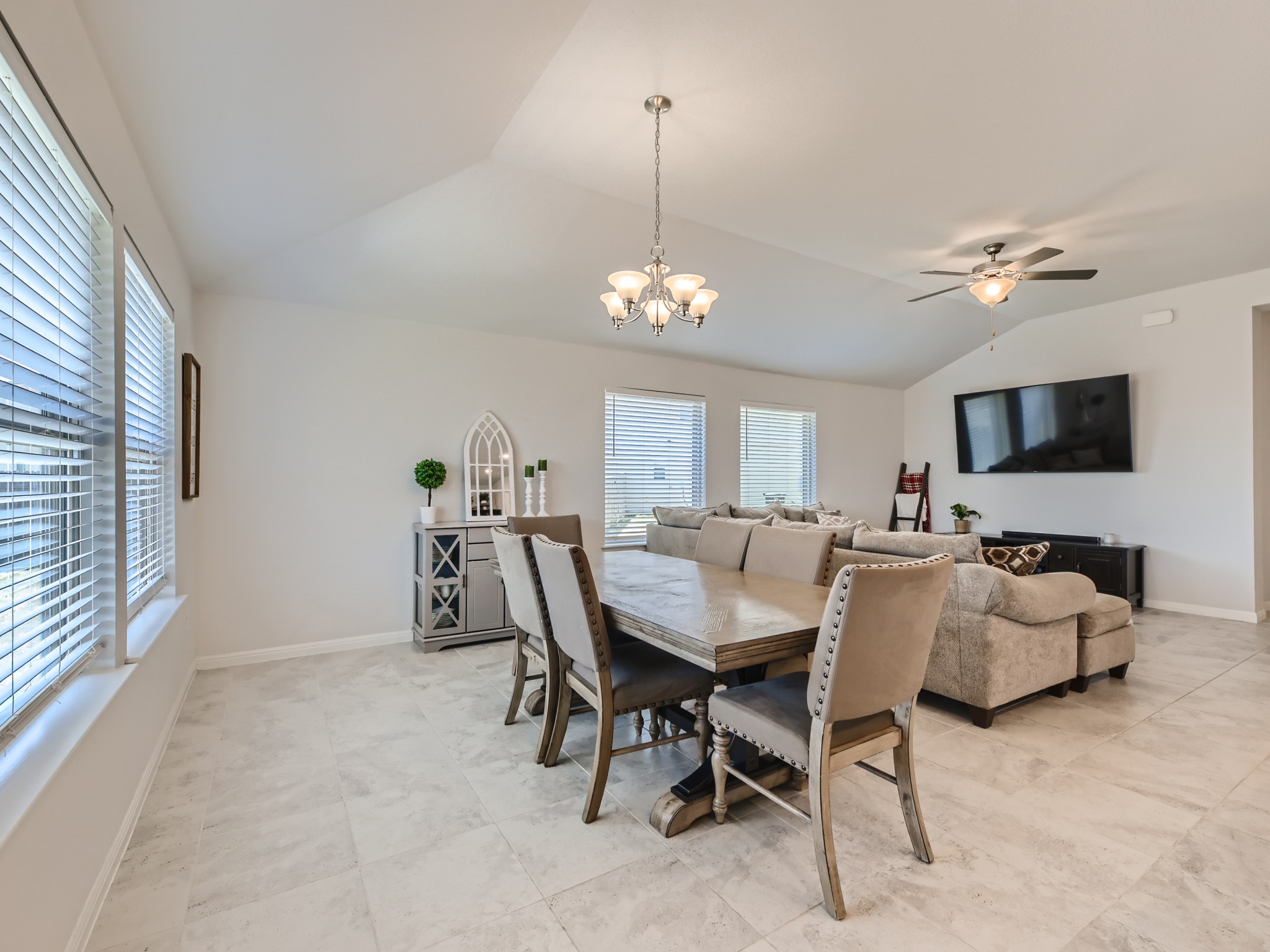 195 Star Light Way Kyle, TX 78640 - Photo 11 of 29 a view of a livingroom with furniture and a chandelier