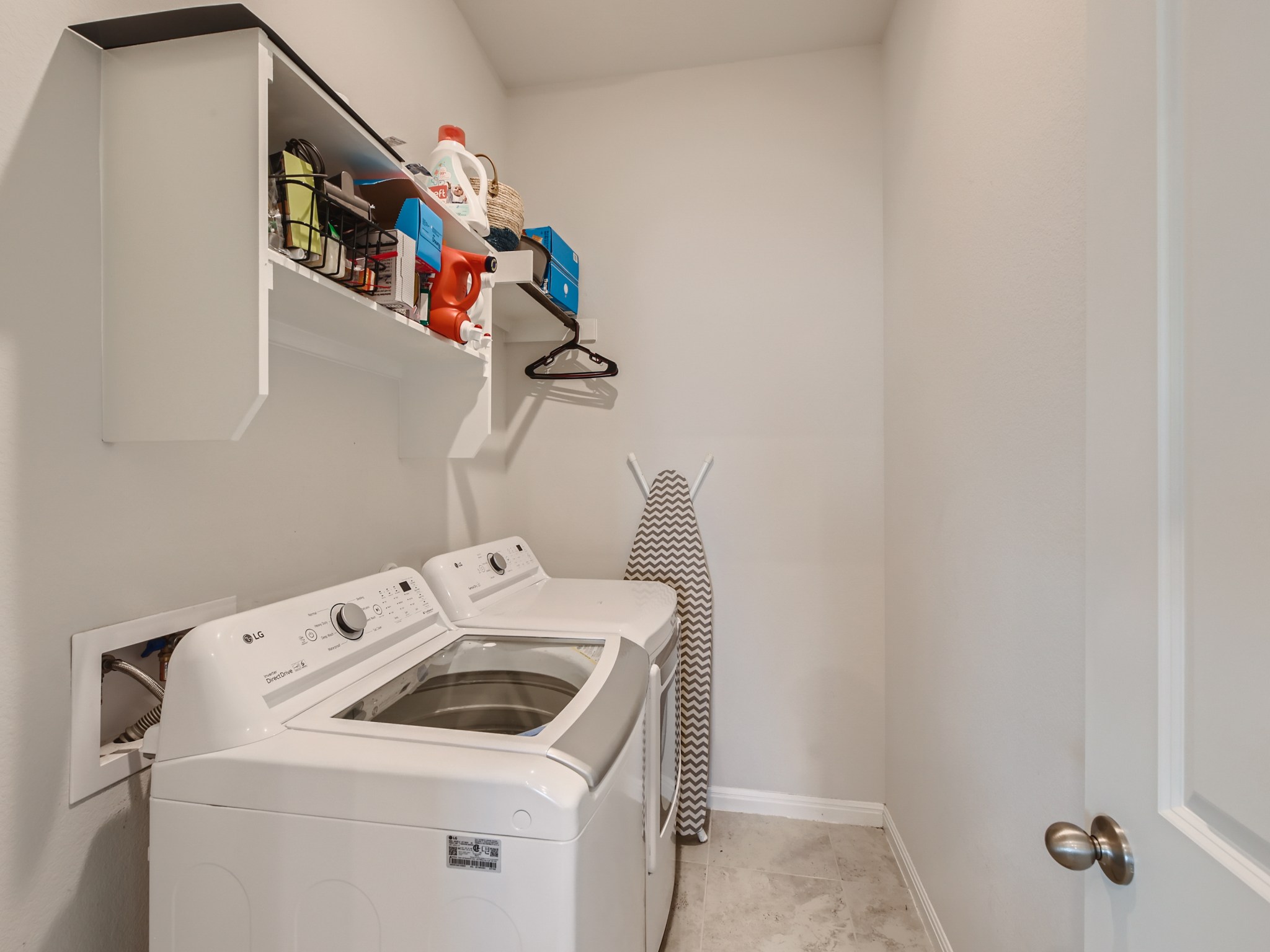 195 Star Light Way Kyle, TX 78640 - Photo 23 of 29 a utility room with dryer and washer