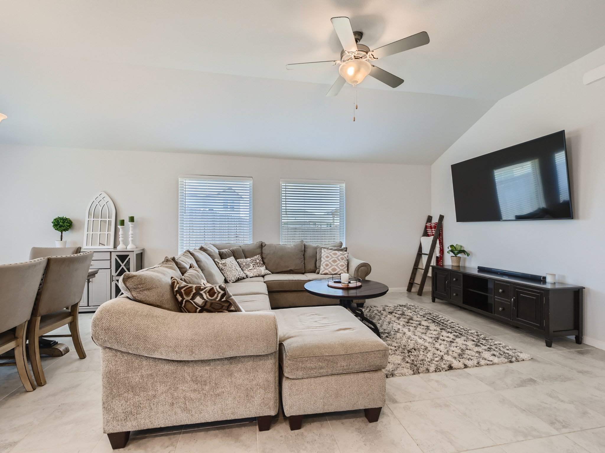 195 Star Light Way Kyle, TX 78640 - Photo 7 of 29 a living room with furniture fireplace and a flat screen tv