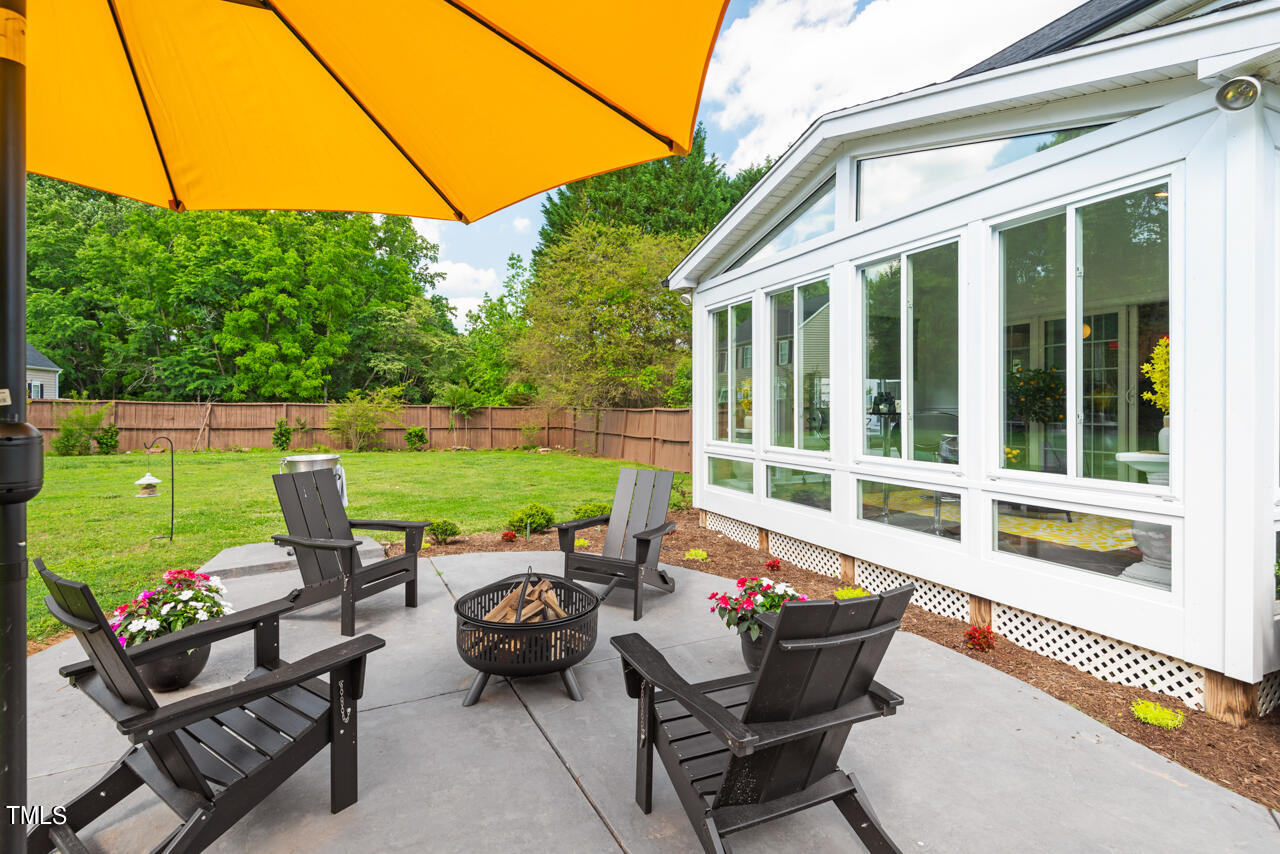 135 Deep Creek Rougemont, NC 27572 - Photo 24 of 72 a view of a patio with couple of chairs and a yard