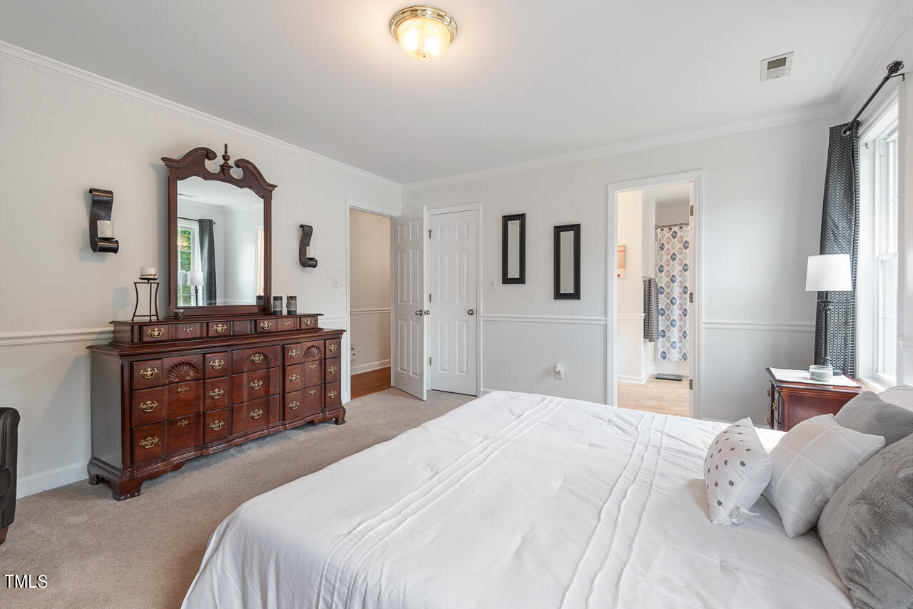 135 Deep Creek Rougemont, NC 27572 - Photo 29 of 72 a bedroom with a bed and a dresser