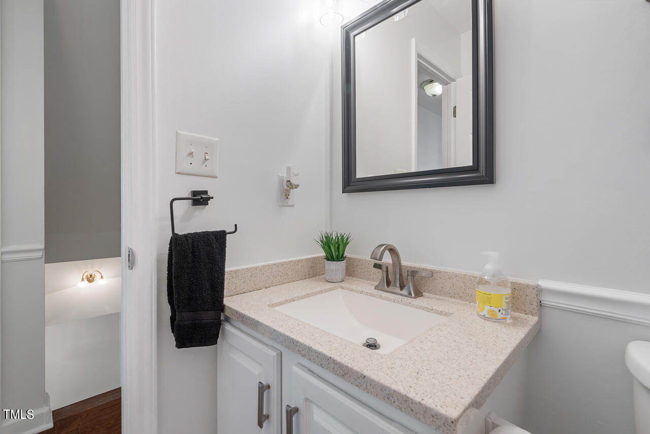 135 Deep Creek Rougemont, NC 27572 - Photo 38 of 72 a bathroom with a sink and a mirror