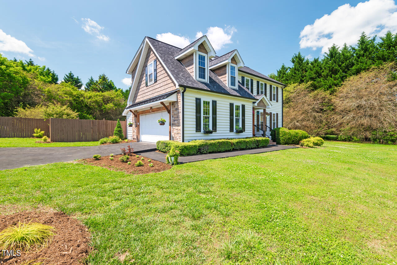 135 Deep Creek Rougemont, NC 27572 - Photo 50 of 72 a view of a house with backyard and sitting area