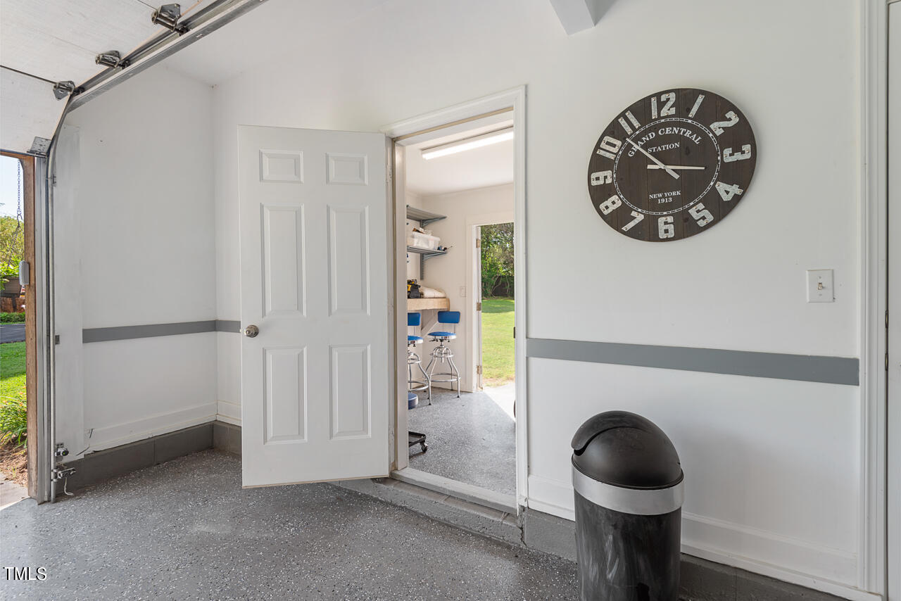 135 Deep Creek Rougemont, NC 27572 - Photo 54 of 72 a view of a hallway with washer and dryer