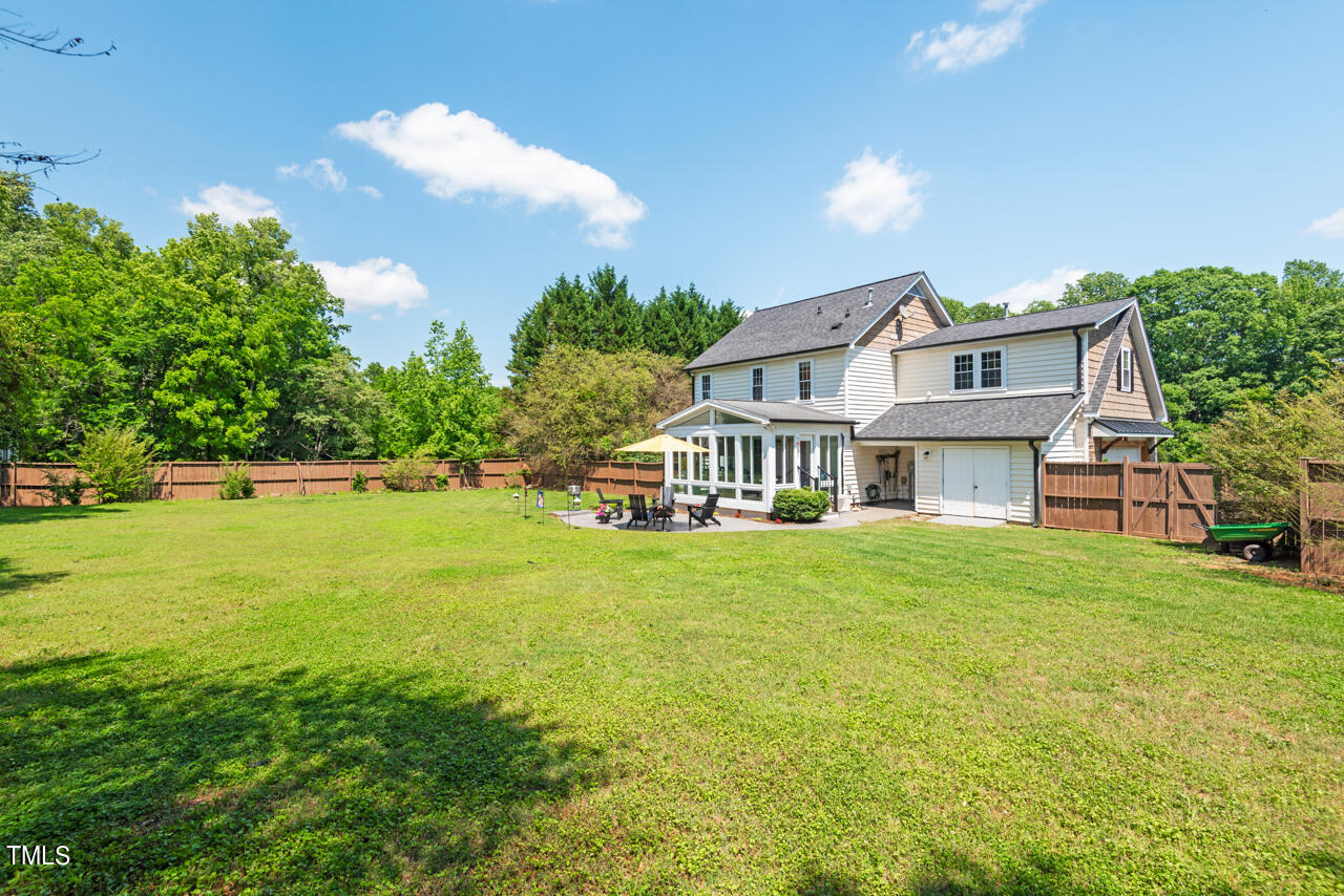 135 Deep Creek Rougemont, NC 27572 - Photo 65 of 72 a front view of a house with a garden