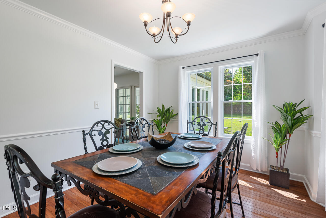 135 Deep Creek Rougemont, NC 27572 - Photo 10 of 72 a view of a dining room with furniture window and wooden floor