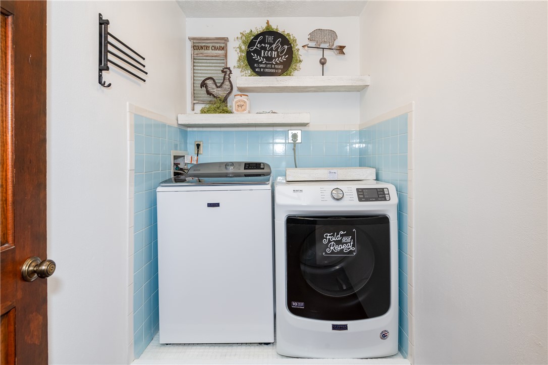 6750 Little Twin Road Germantown, OH 45327 - Photo 29 of 88 This dedicated laundry space offers practical convenience for daily chores.