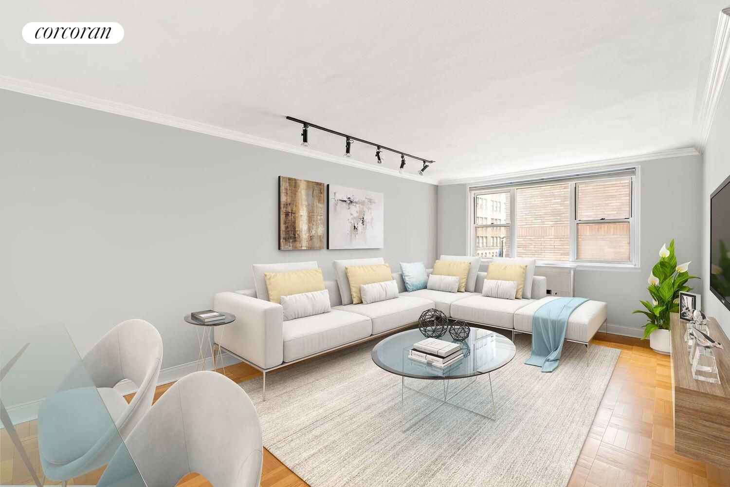 139 East 33rd Street, Unit 7L Manhattan, NY 10016 - Photo 2 of 11 a living room with furniture and wooden floor