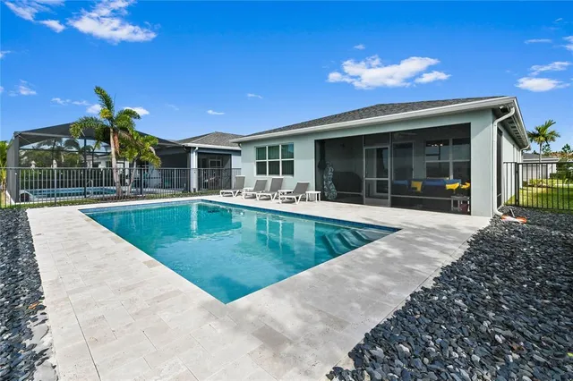 a view of a house with swimming pool
