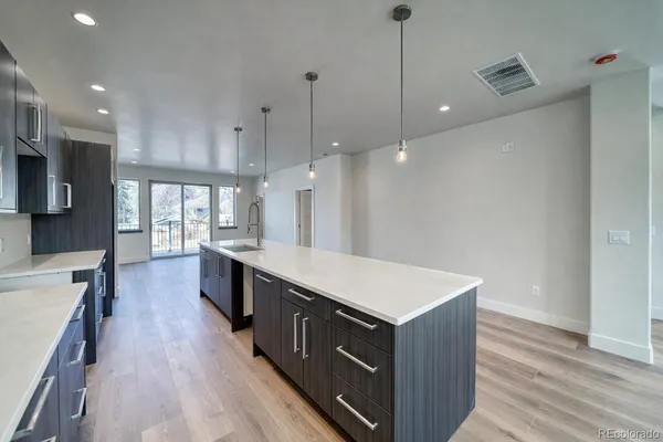 a bedroom with a large bed and a flat screen tv