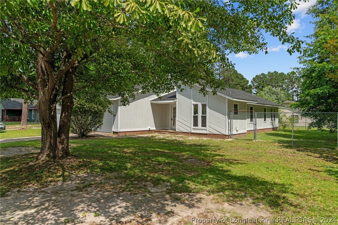 112 Maranatha Circle Spring Lake, NC 28390 - Photo 2 of 33 a view of a house with a backyard