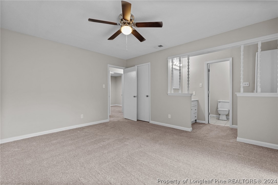 112 Maranatha Circle Spring Lake, NC 28390 - Photo 24 of 33 an empty room with chandelier fan
