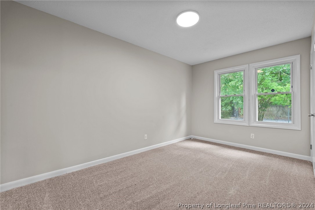 112 Maranatha Circle Spring Lake, NC 28390 - Photo 29 of 33 an empty room with windows