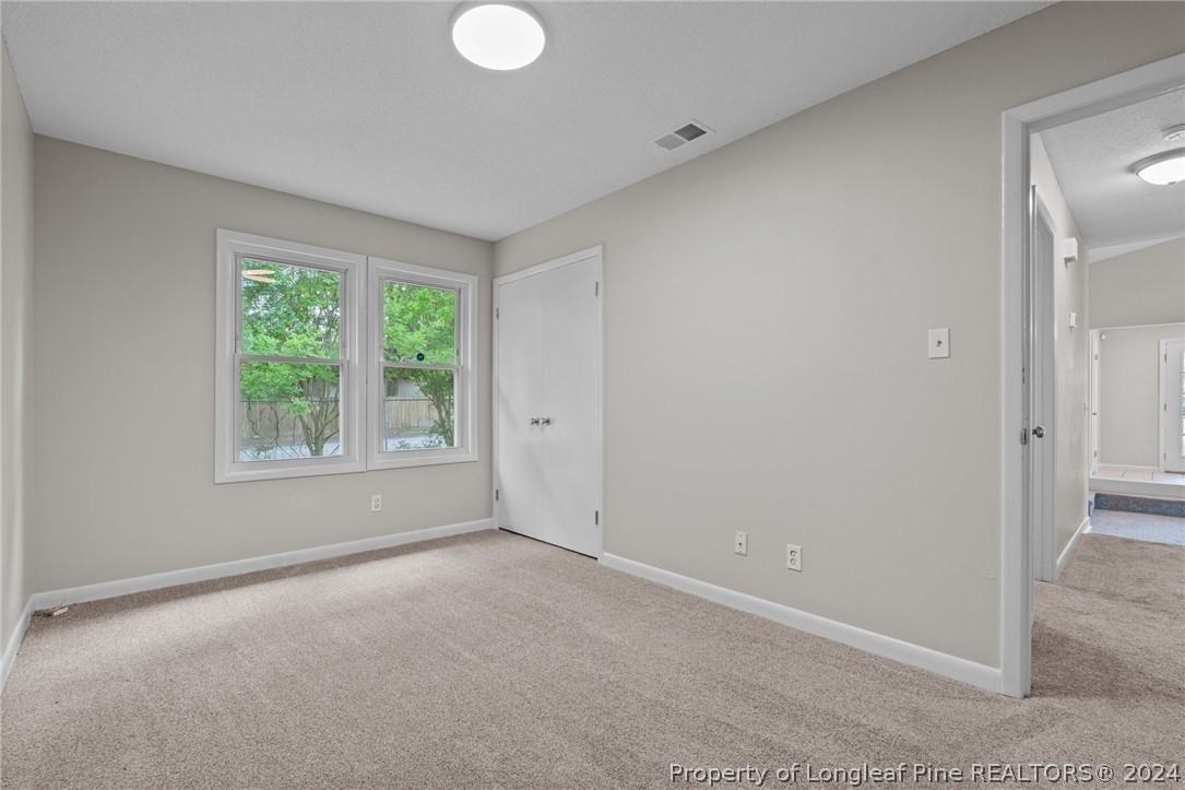 112 Maranatha Circle Spring Lake, NC 28390 - Photo 30 of 33 a view of an empty room with a window