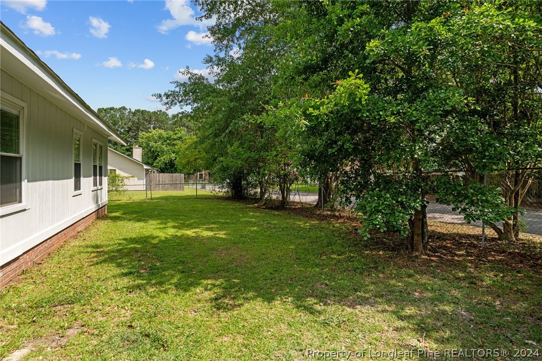 112 Maranatha Circle Spring Lake, NC 28390 - Photo 6 of 33 a view of outdoor space with deck and yard