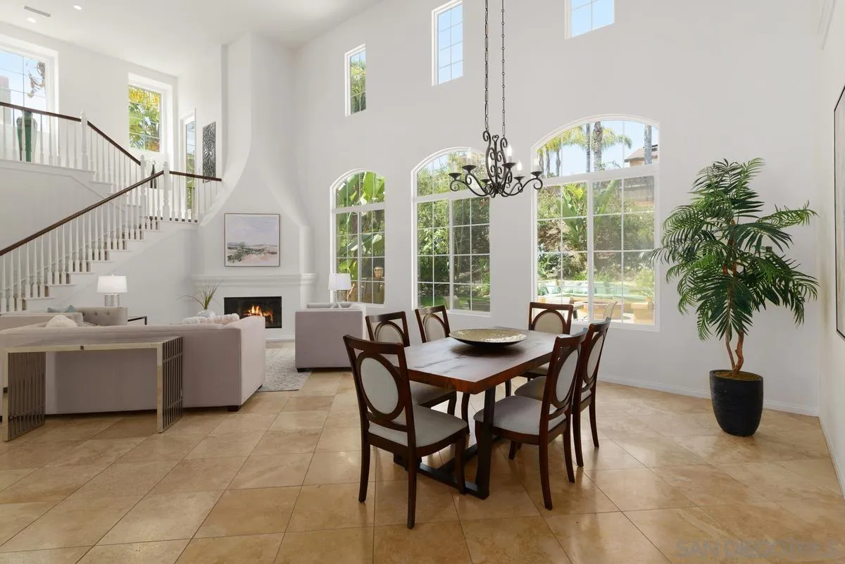 7542 Circulo Sequoia Carlsbad, CA 92009 - Photo 5 of 24 a view of a dining room with furniture window and flowerpot