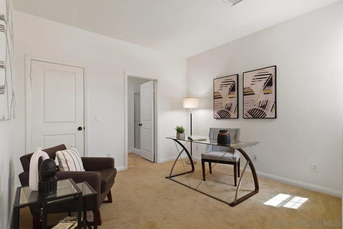7542 Circulo Sequoia Carlsbad, CA 92009 - Photo 9 of 24 a work room with furniture and windows