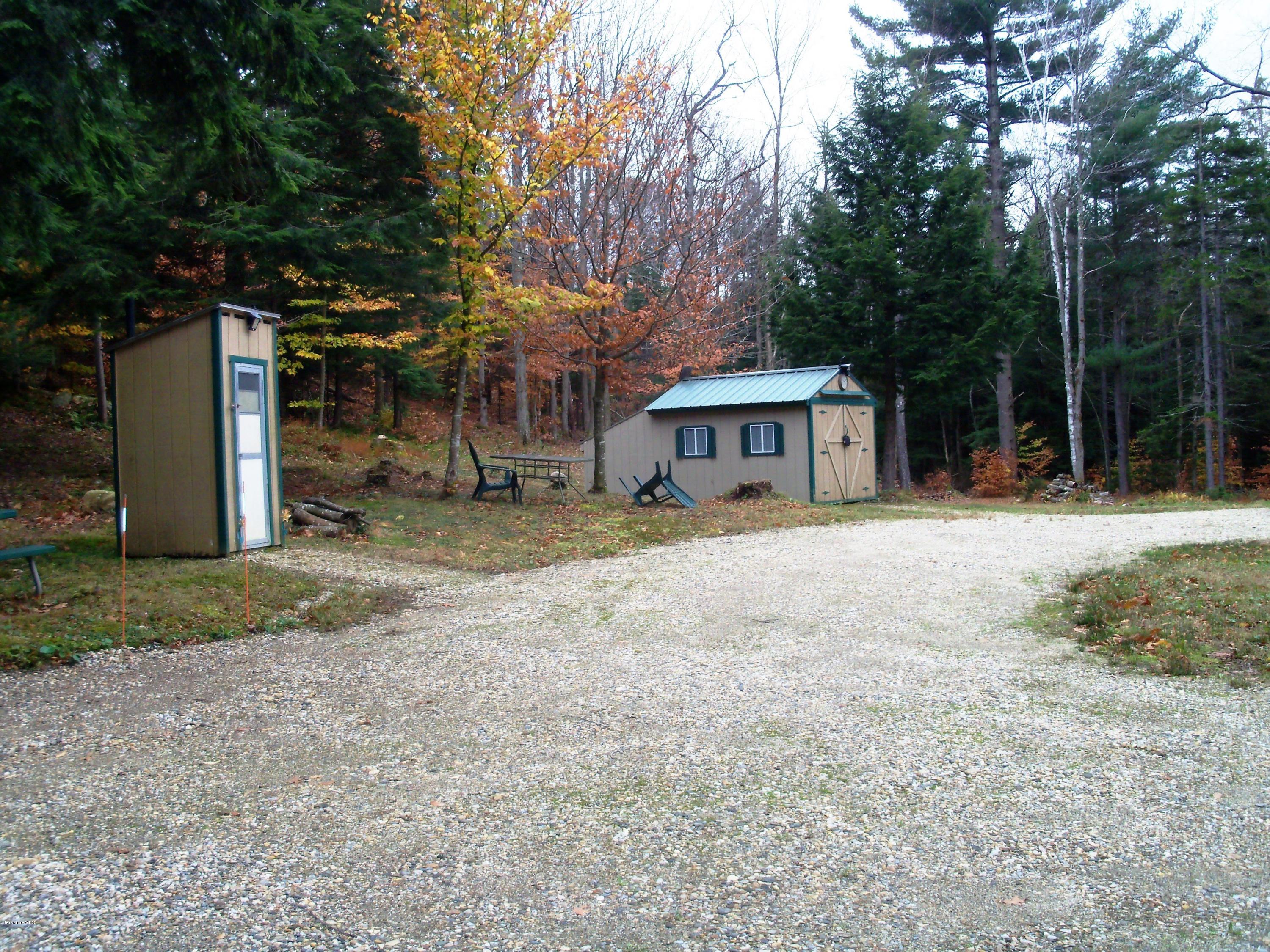 20 S Road Peru, MA 01235 - Photo 1 of 24 a house with trees in front of it