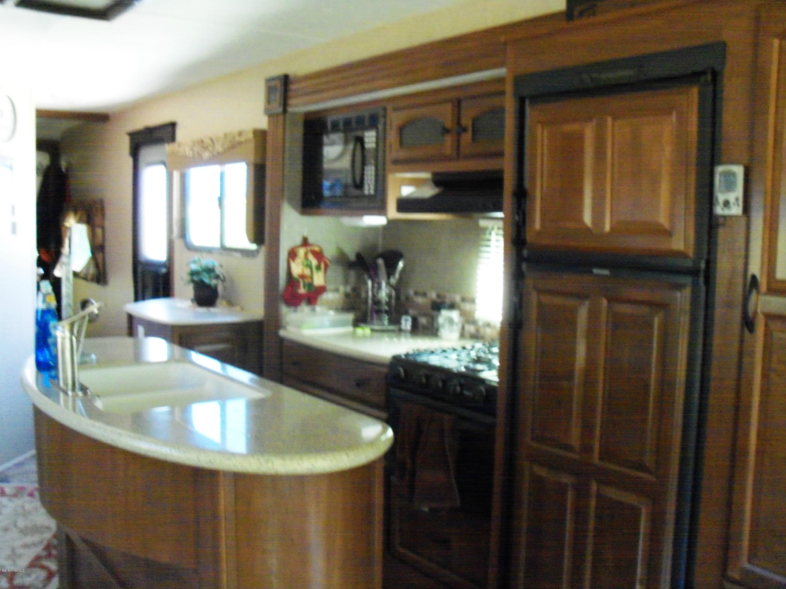 20 S Road Peru, MA 01235 - Photo 12 of 24 a room with granite countertop a sink and cabinets