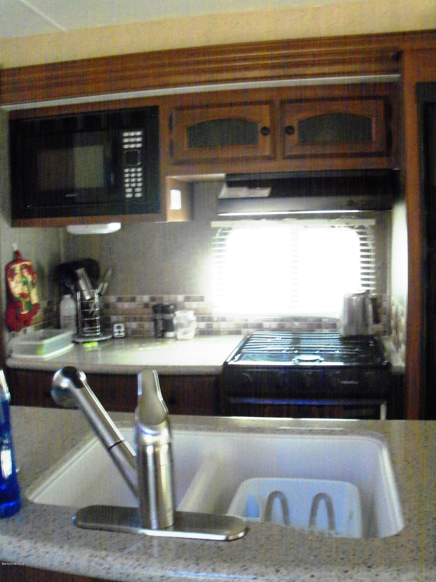 20 S Road Peru, MA 01235 - Photo 13 of 24 a kitchen with a sink and a microwave