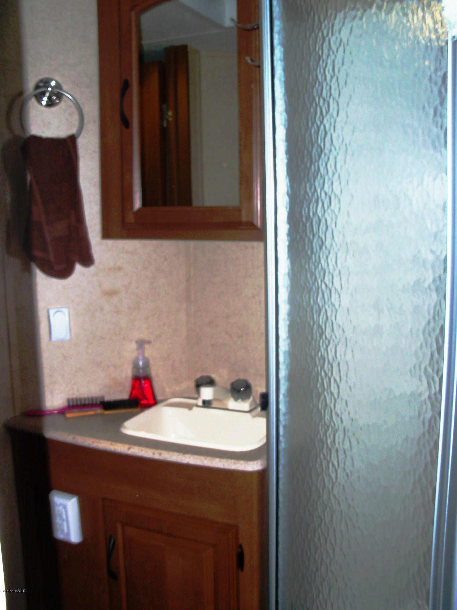 20 S Road Peru, MA 01235 - Photo 20 of 24 a bathroom with a sink and a mirror