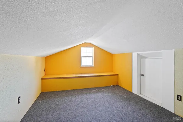 a view of livingroom with furniture