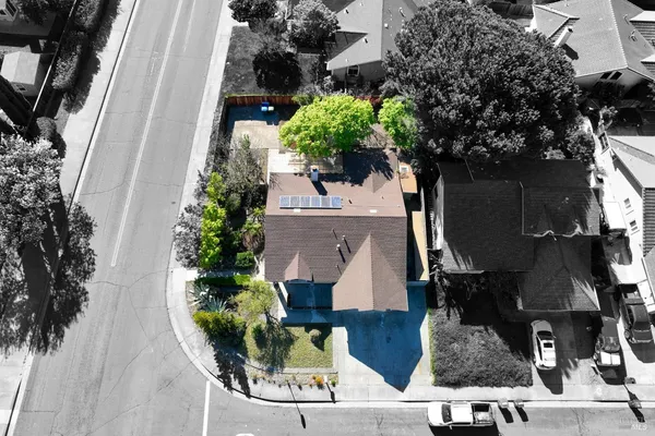 an aerial view of houses with outdoor space