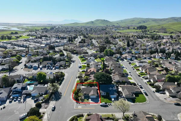 an aerial view of residential house and outdoor space