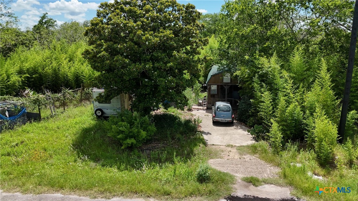 340 Cypress Valley Road Cuero, TX 77954 - Photo 2 of 23 a pathway of a garden