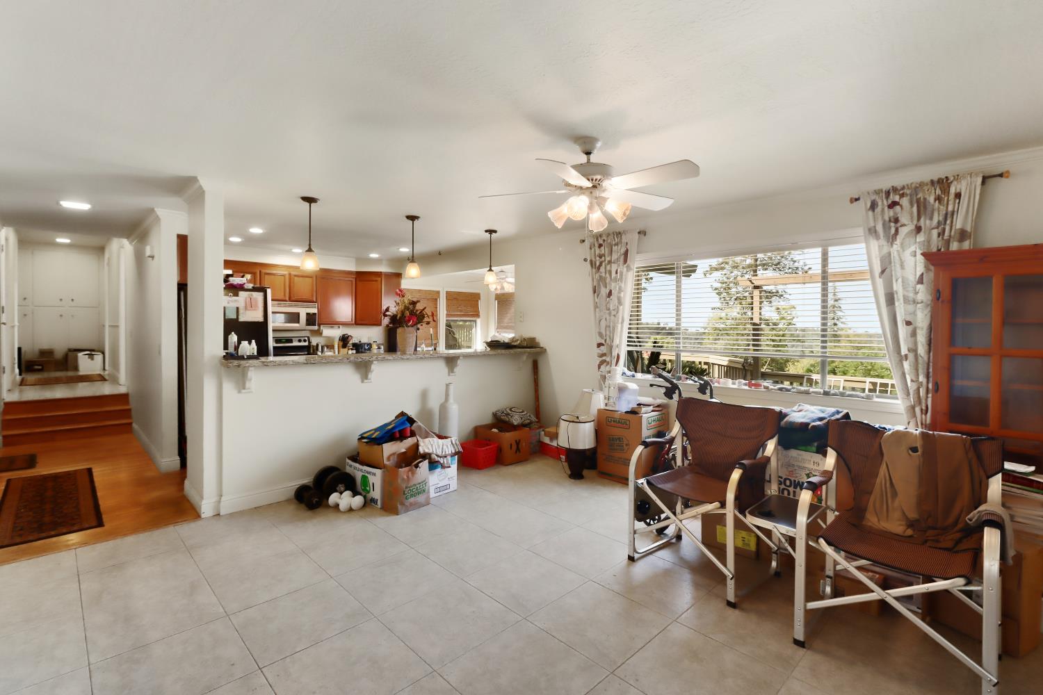 1635 Country Club Drive Placerville, CA 95667 - Photo 12 of 58 a view of a dining area with furniture window and outside view