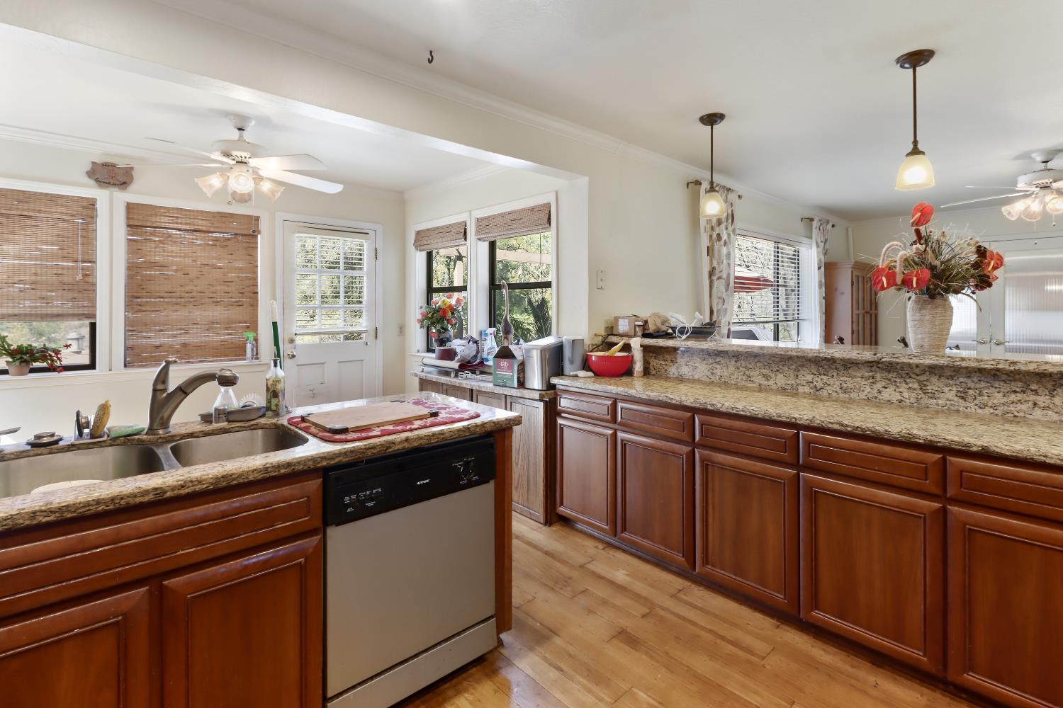 1635 Country Club Drive Placerville, CA 95667 - Photo 17 of 58 a kitchen with sink and wooden cabinets