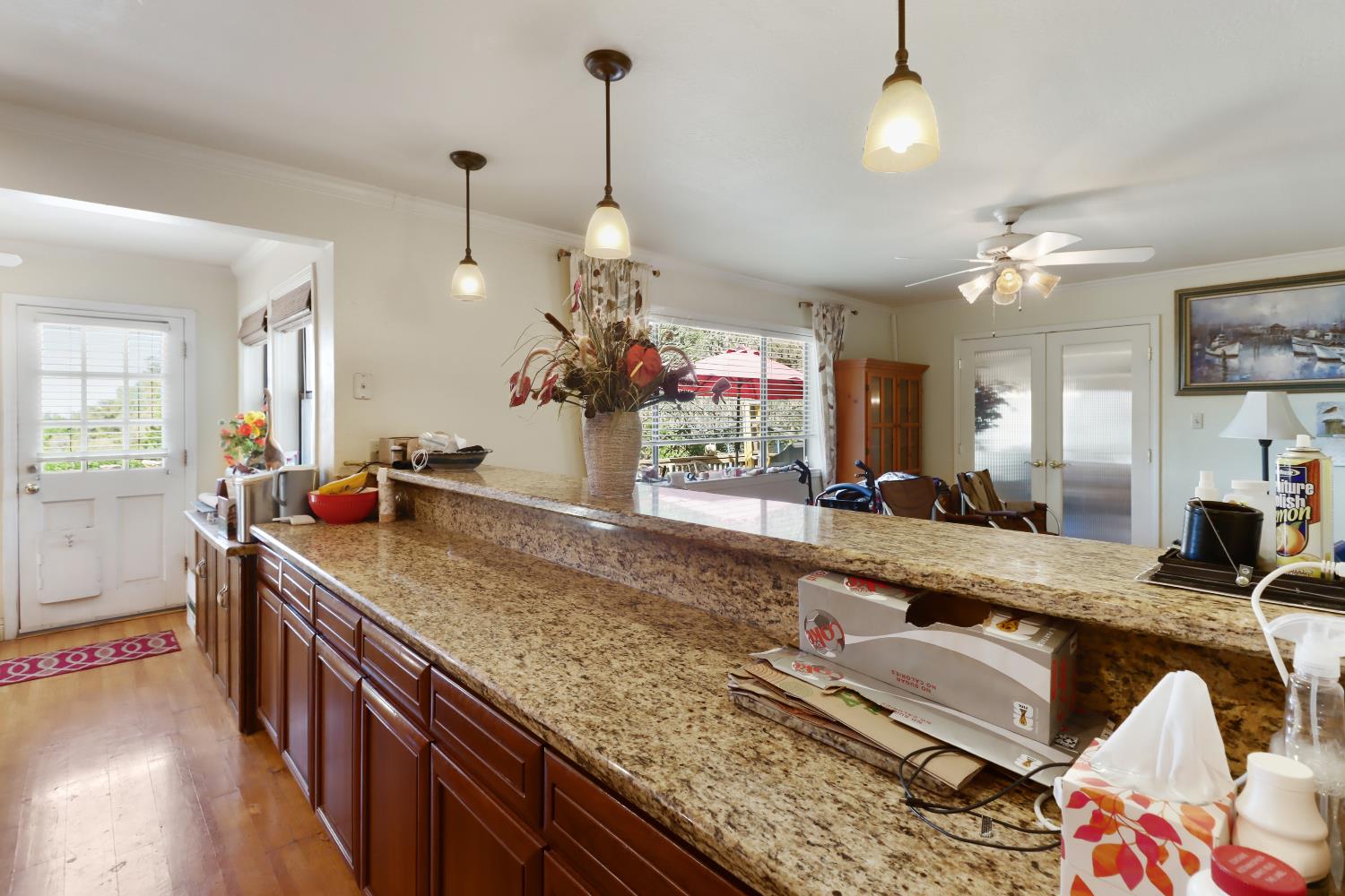 1635 Country Club Drive Placerville, CA 95667 - Photo 19 of 58 a view of a kitchen island furniture and a chandelier