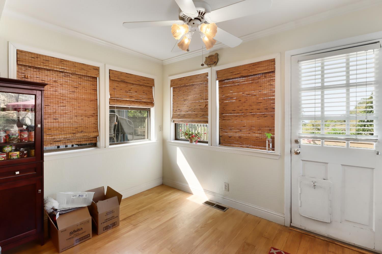1635 Country Club Drive Placerville, CA 95667 - Photo 21 of 58 a view of an empty room with a window and wooden floor