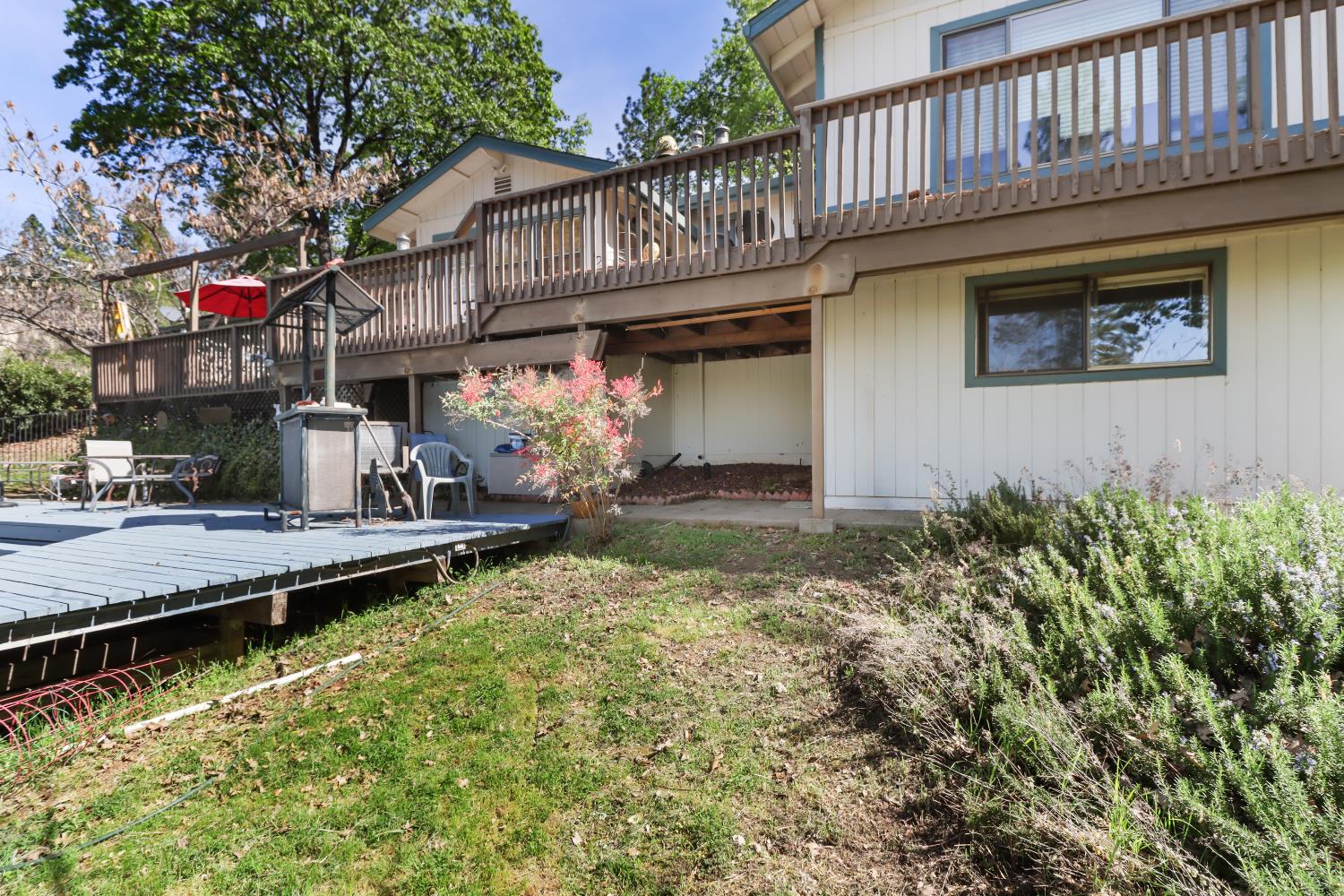 1635 Country Club Drive Placerville, CA 95667 - Photo 49 of 58 a front view of a house with swimming pool