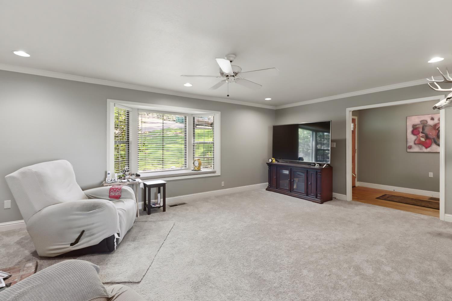 1635 Country Club Drive Placerville, CA 95667 - Photo 5 of 58 a living room with furniture and a flat screen tv