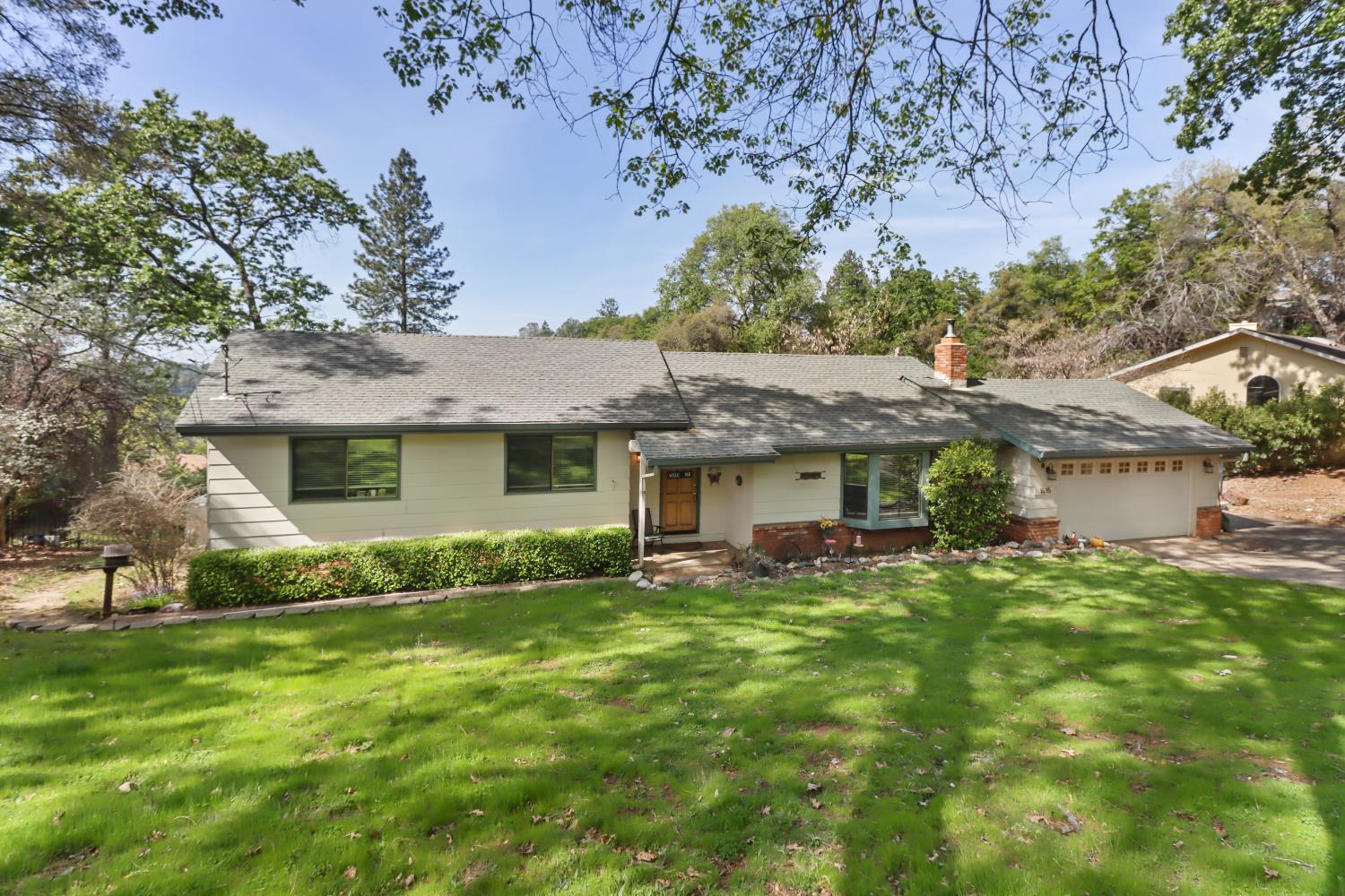 1635 Country Club Drive Placerville, CA 95667 - Photo 58 of 58 a front view of a house with garden