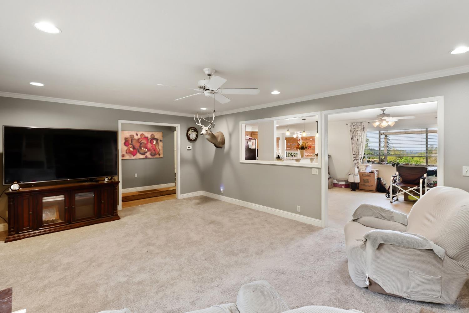 1635 Country Club Drive Placerville, CA 95667 - Photo 6 of 58 a living room with furniture and a flat screen tv