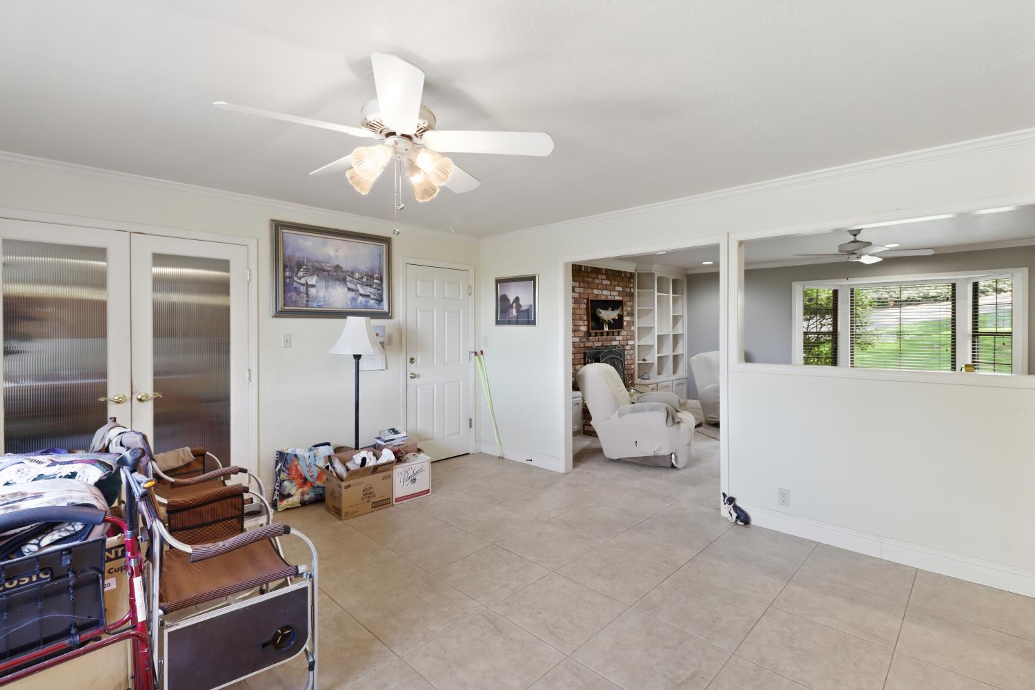 1635 Country Club Drive Placerville, CA 95667 - Photo 10 of 58 a room with gym equipment and a large window