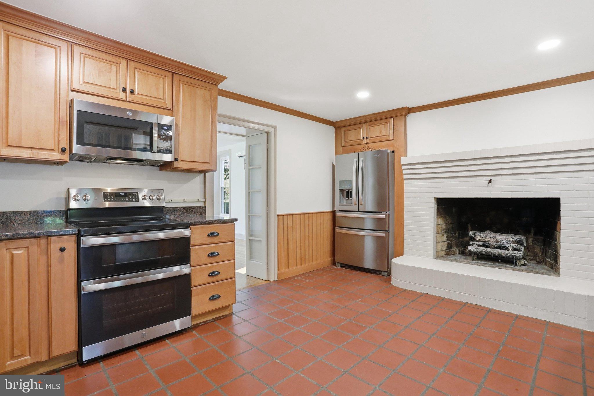 8805 Reichard Road Fairplay, MD 21733 - Photo 37 of 77 Charming kitchen with rustic tile and warmth.