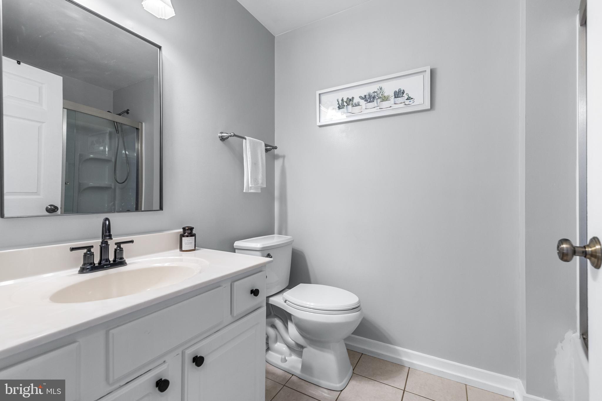 12270 High Point Road Felton, PA 17322 - Photo 16 of 45 a bathroom with a toilet sink and mirror