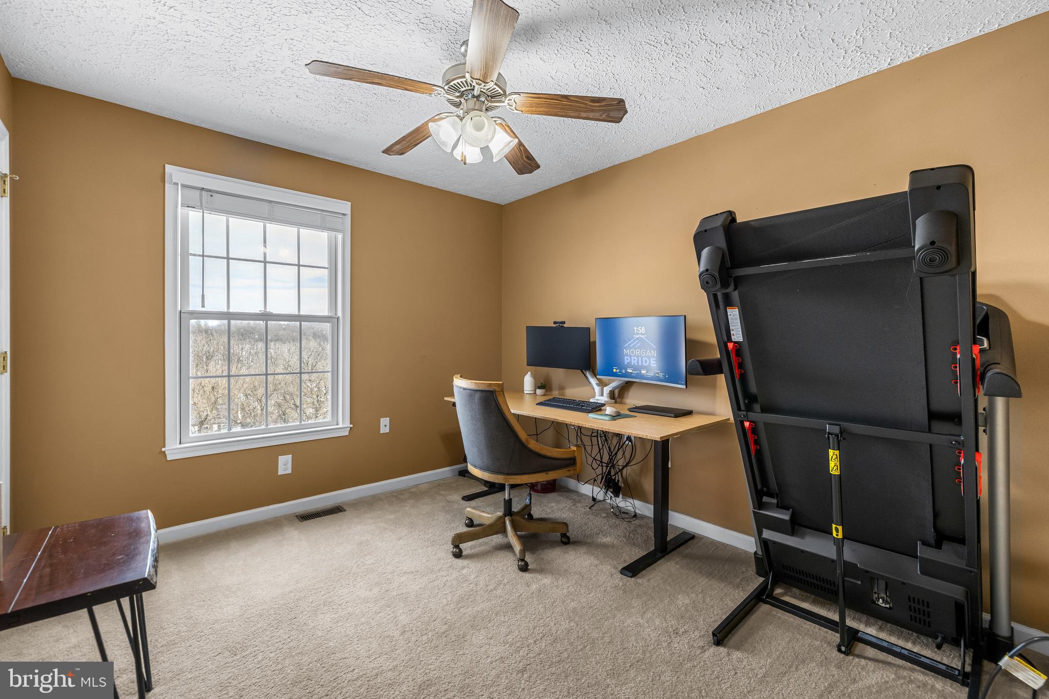 12270 High Point Road Felton, PA 17322 - Photo 18 of 45 a view of a workspace with furniture and a window