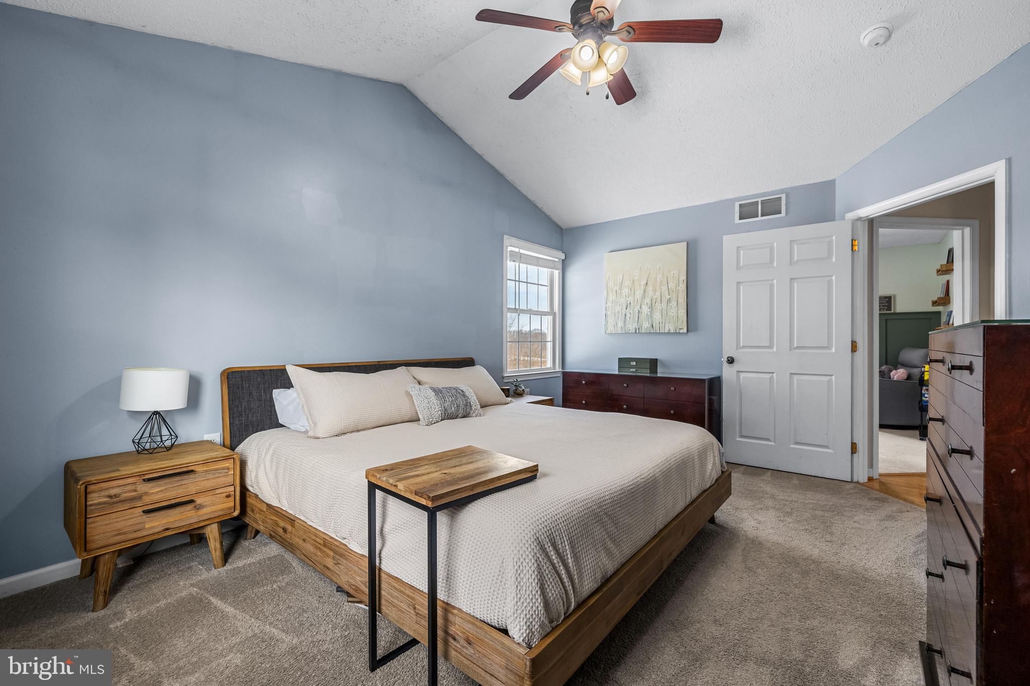 12270 High Point Road Felton, PA 17322 - Photo 23 of 45 a bedroom with a bed and a chandelier